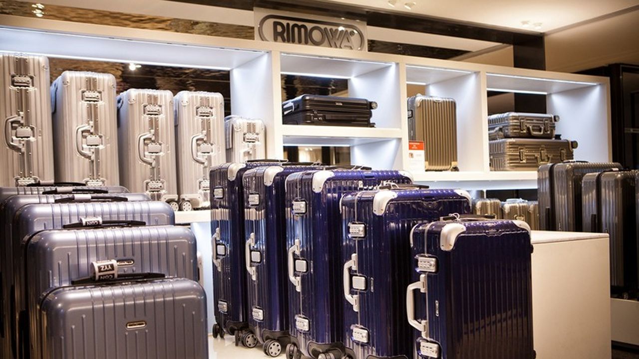 Ремонт выдвижной ручки чемодана Rimowa Ремонт выдвижной ручки чемодана Rimowa